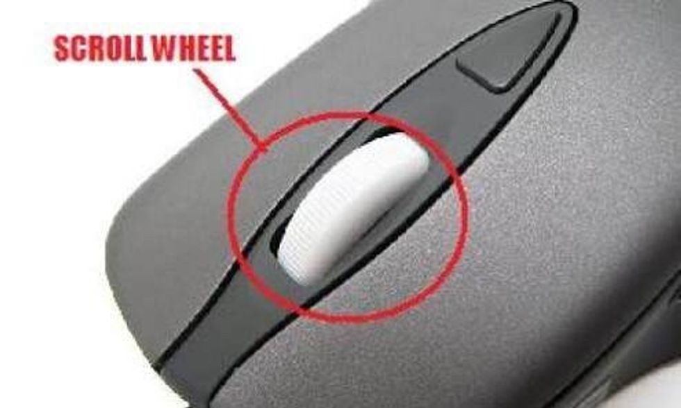 The wheel in the middle of the mouse is used for scrolling up and down pages, just use your finger and roll it up and down