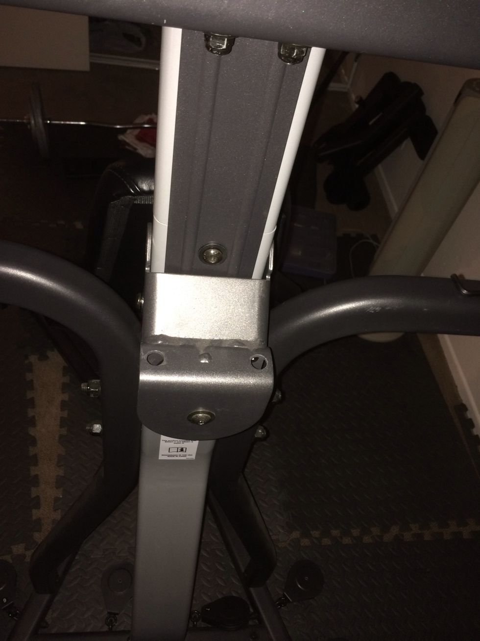 The wheel is the backbone, remove that first large bolt. Then 5 other smaller bolts.