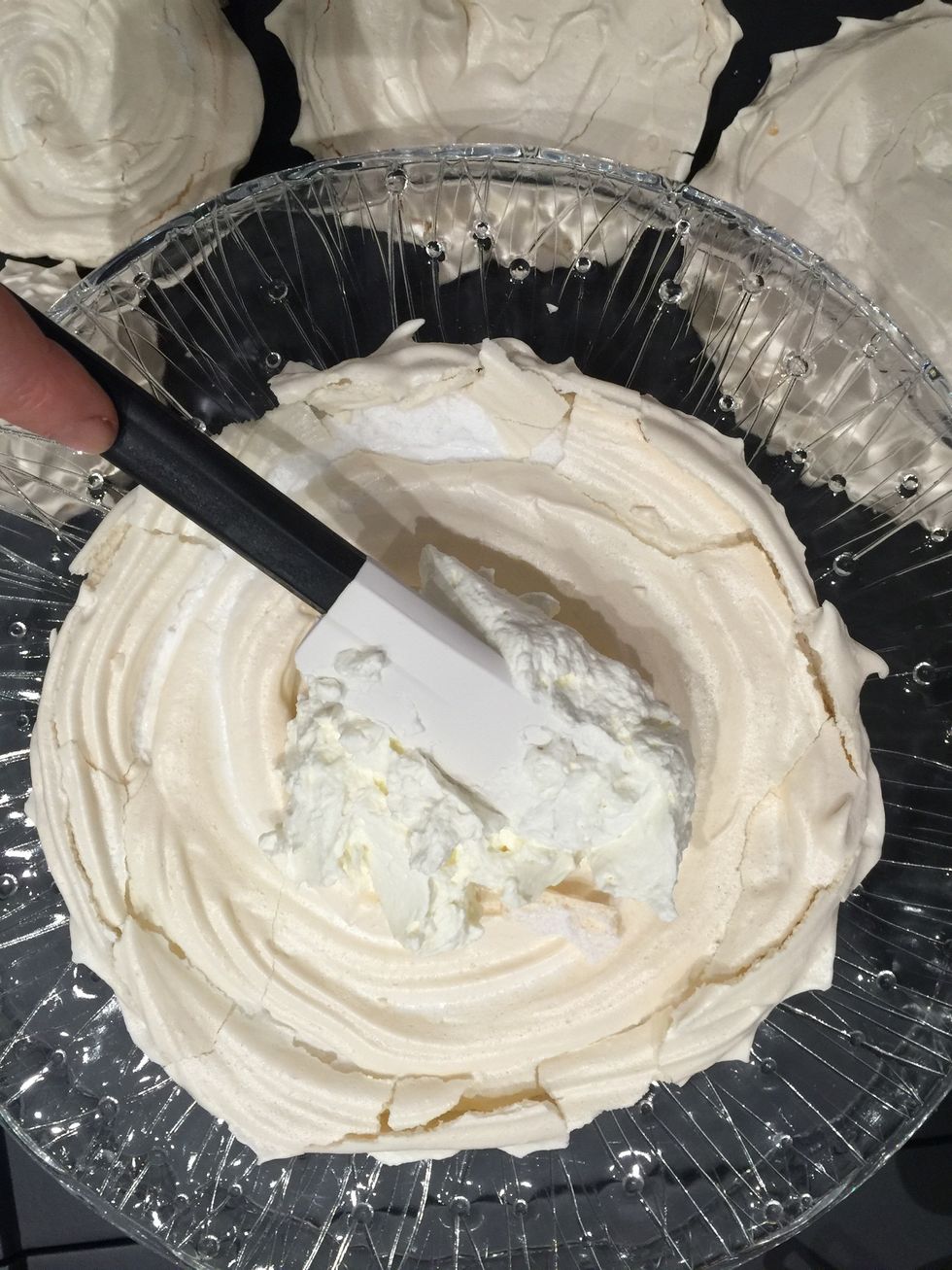 The whipped cream is ready sart building the cake. First layer