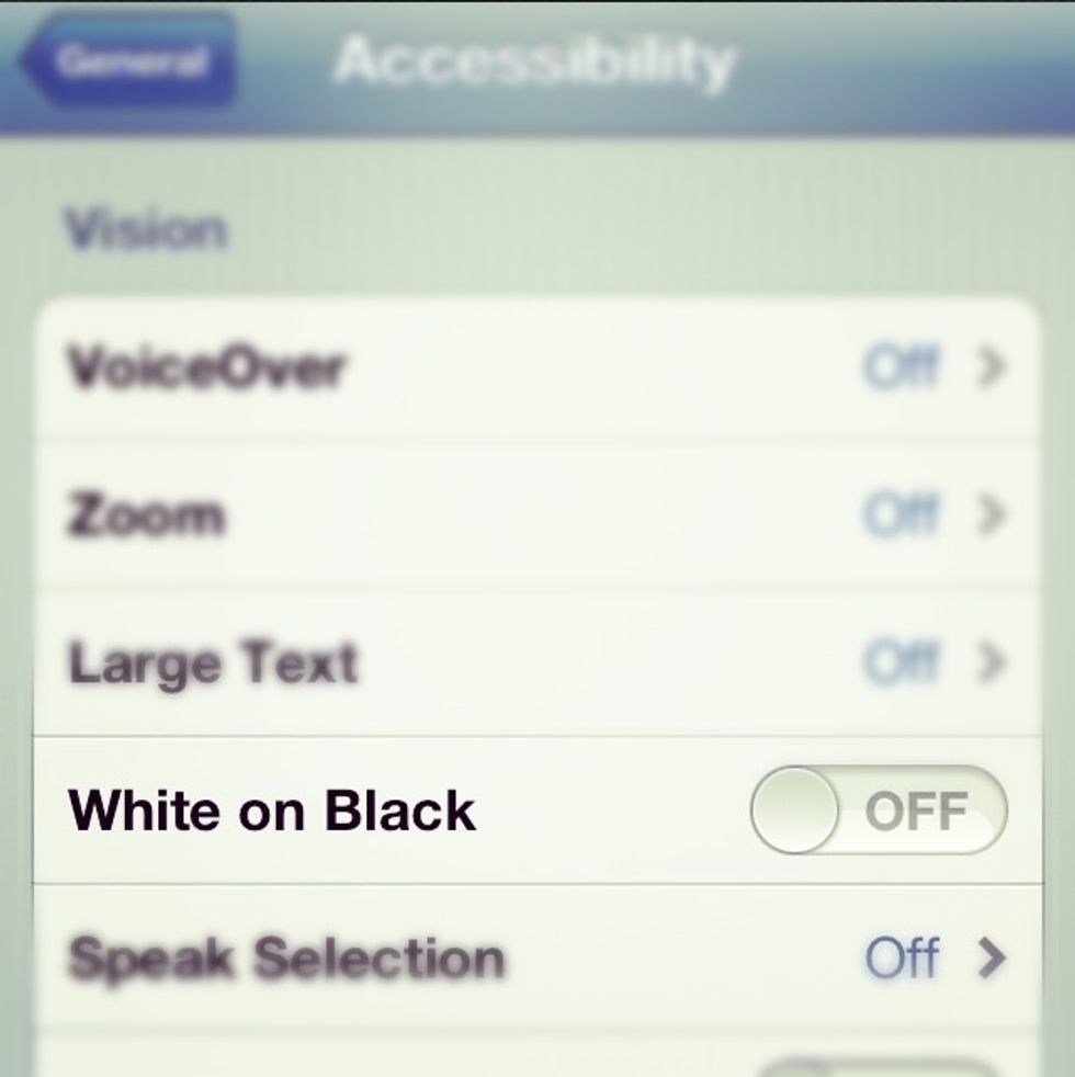 The 'White on Black' setting will be turned off by default on every iOS device.