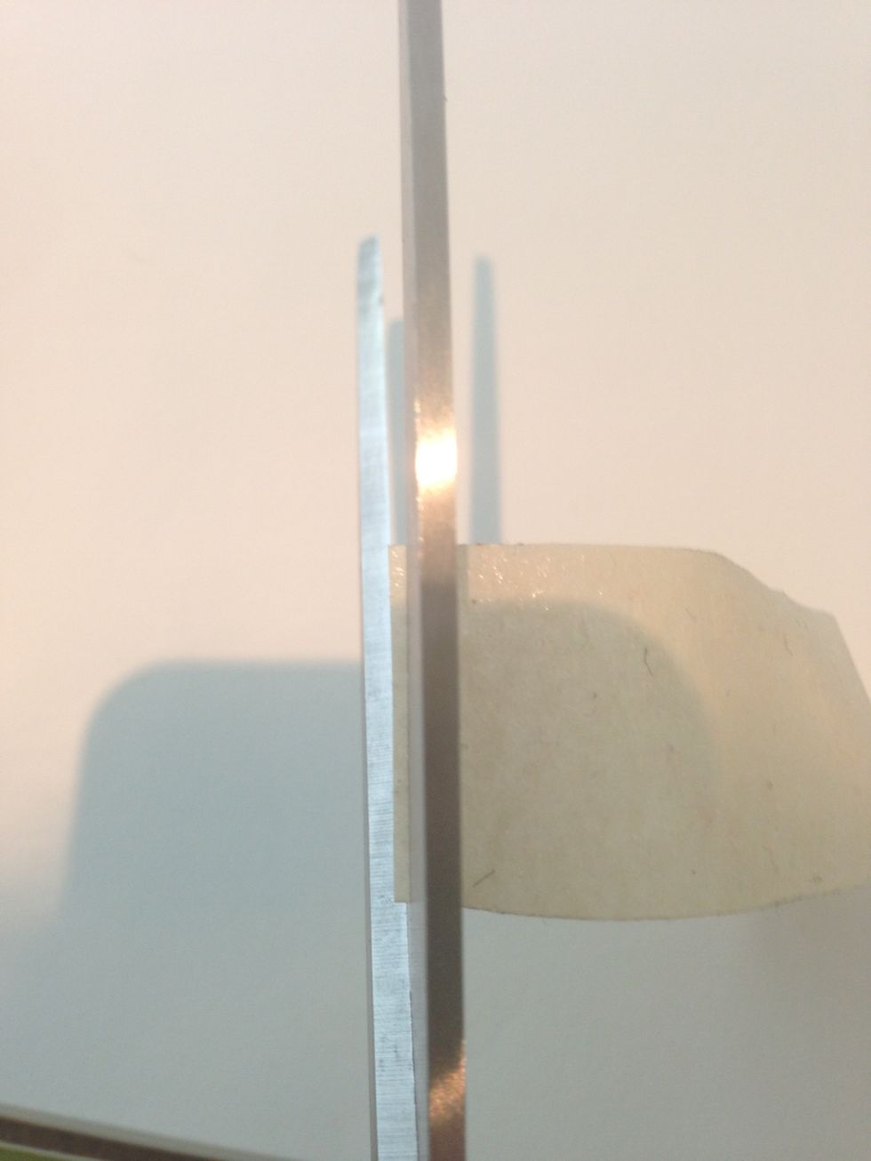 The width of your tape will be determined by how far the tape hangs over the edge of the scissor. I want mine pretty thin so I barely let my tape peek over. Make sure that your tape is straight.