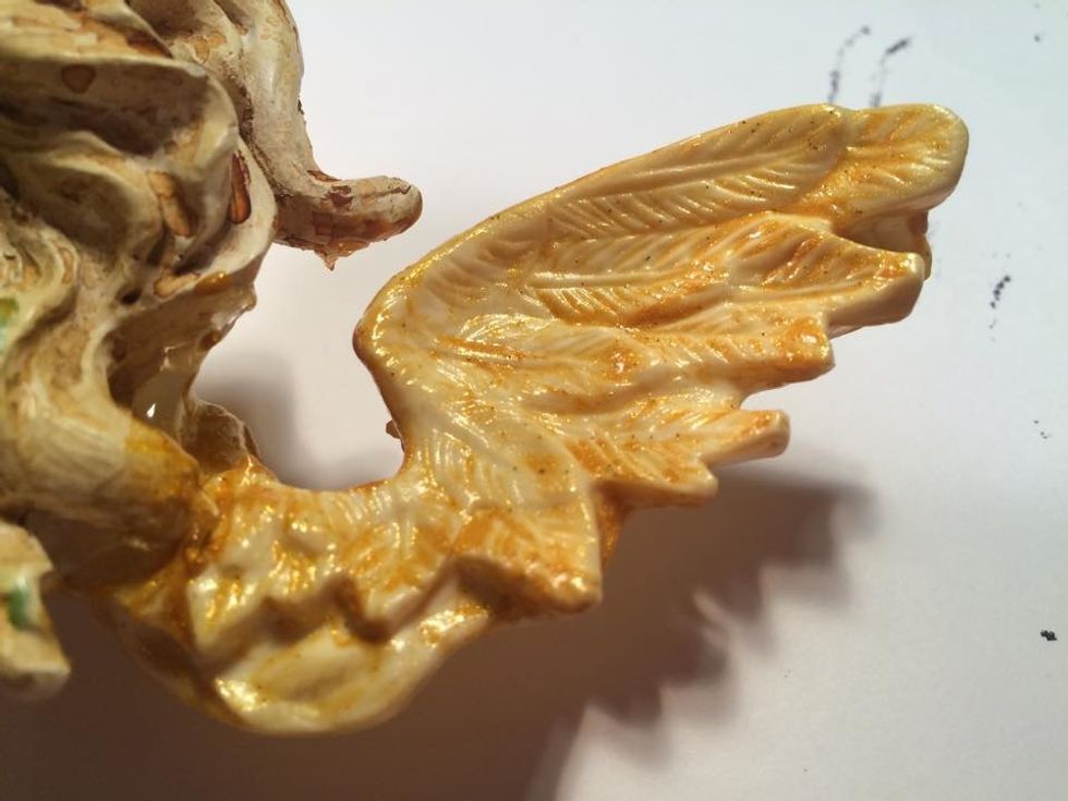 The wings I did in Vegas Gold. I brushed it all over both sides. Heavier in some spots so the light would catch them differently. I dried with my heat gun and applied a second coat.