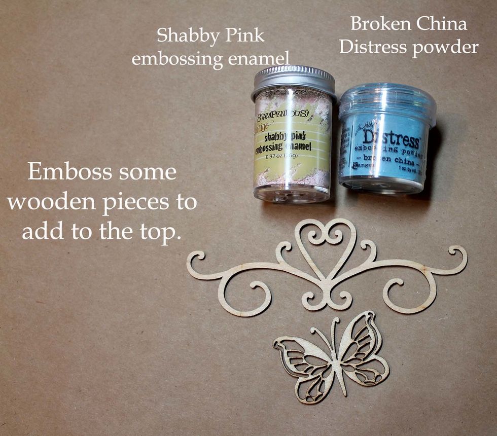 The wood flourishes are Kaisercraft (Scrapbook); Shabby Pink embossing enamel (Stampendous); Distress powder (Tim Holtz).