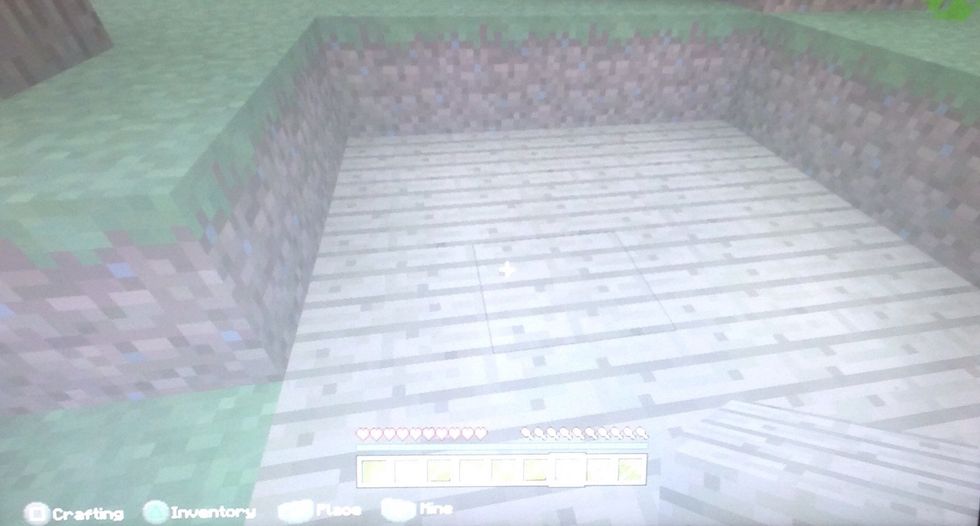 The wooden planks are set down so now build the walls and roof.