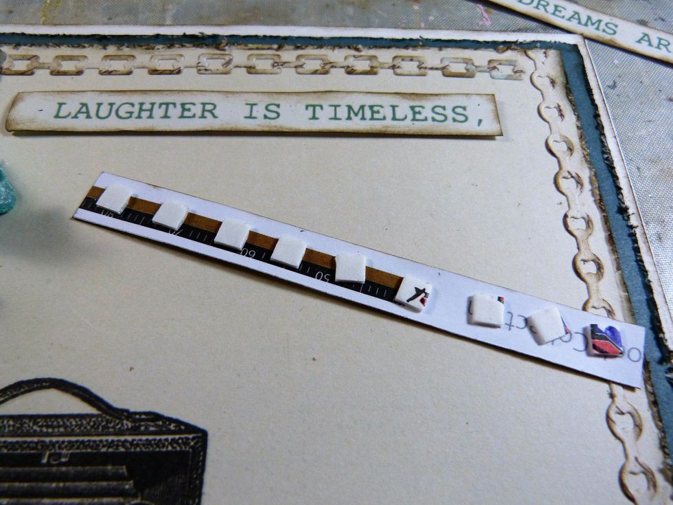 The wording needs the edges inked and then fixed to the card with foam pads to lift of the page slightly.