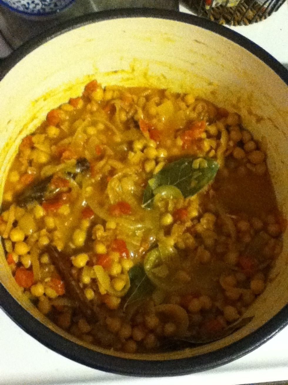 Then a cup of water. Stir to combine, and bring to a boil.