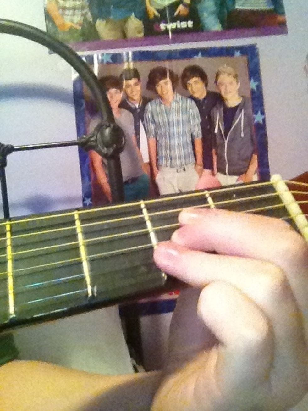 Then A (first finger: forth string, second fret; second finger: third string, second fret; third finger: second string, second fret)