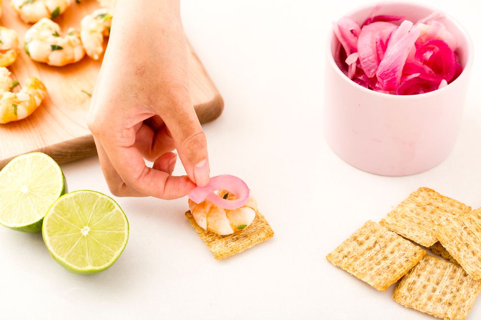 Then a slice of quick-pickled red onion.