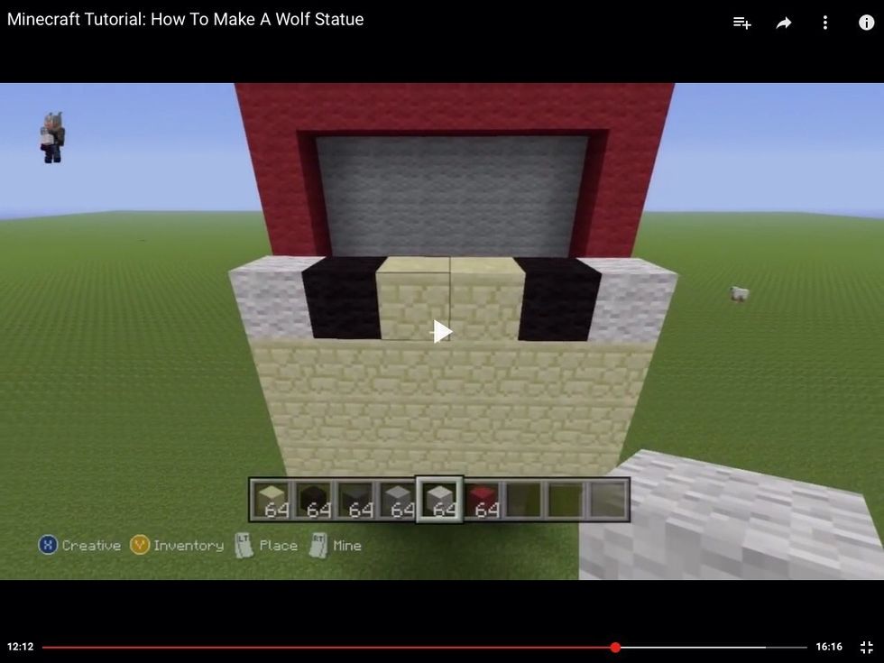 Then above the sandstone put 2 more and then put black and white wool beside each other on the same row