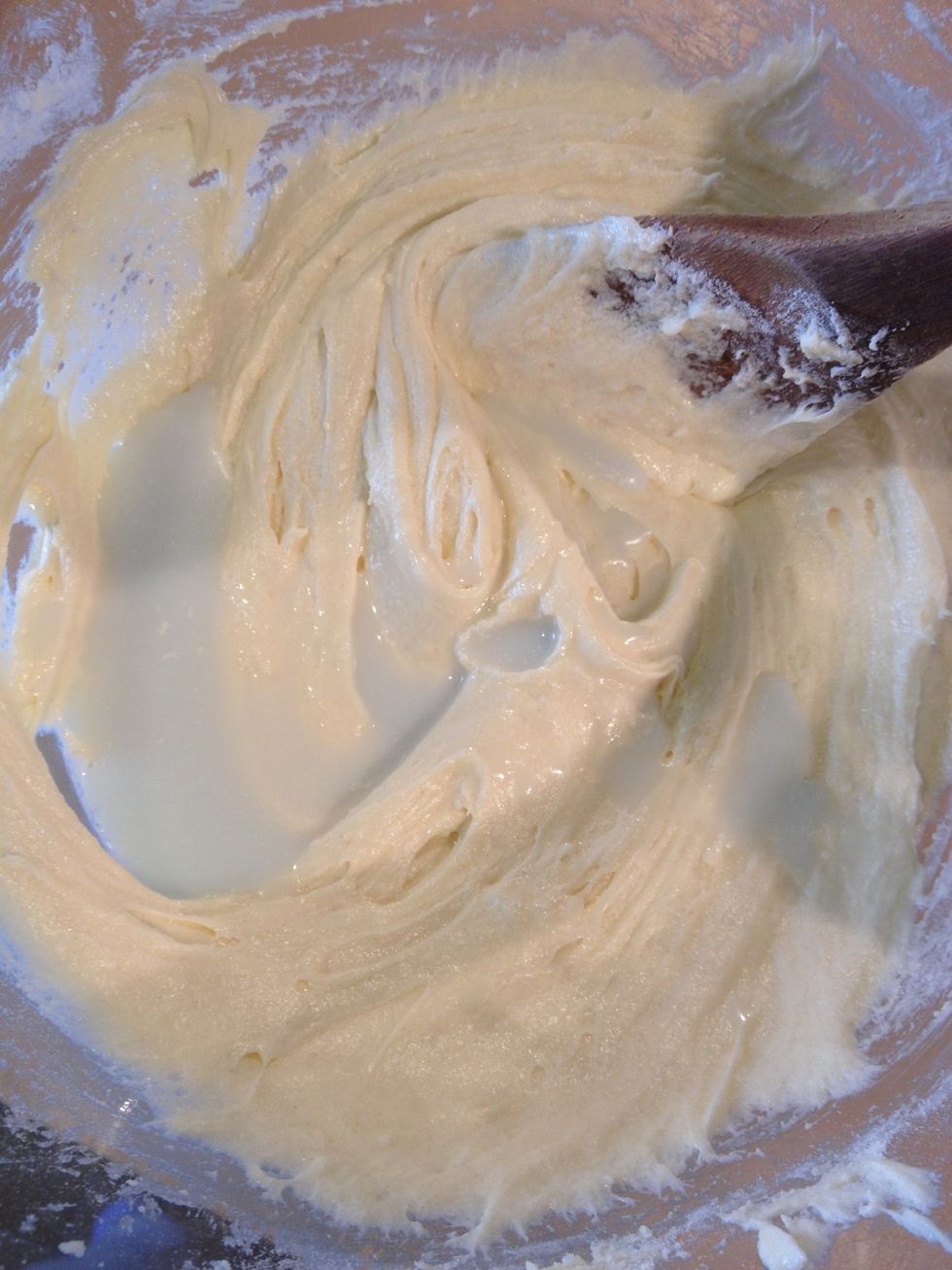Then add 1/3 of the milk. Repeat until all the flour and milk is mixed in.