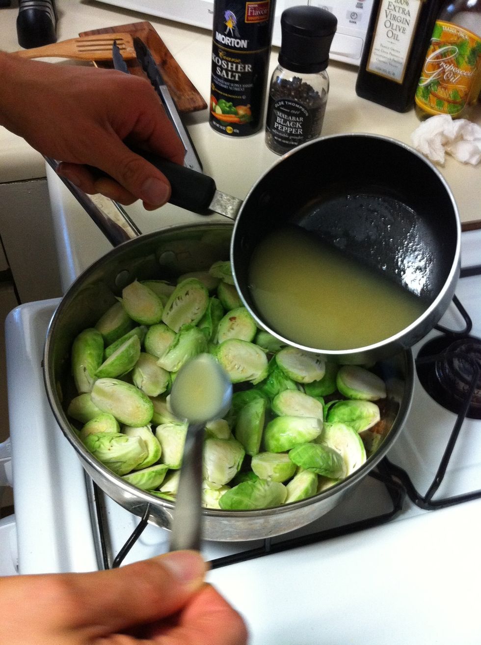 Then add 1/4 cup of chicken broth right away. The broth is added to help scrape up the fond on the bottom of the pan. I make sure to use hot broth so it doesn't reduce the temperature in the skillet