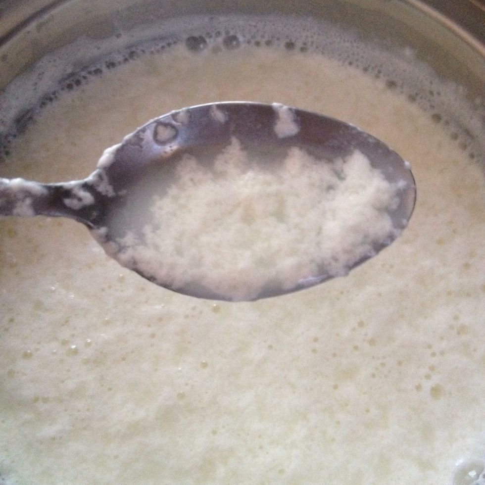 Then add 1 tsp lemon and while it's on stove you will see the milk curdle now remove from stove