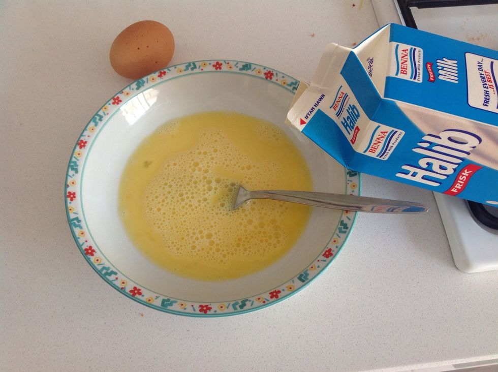 Then add 2 tablespoons of milk.
