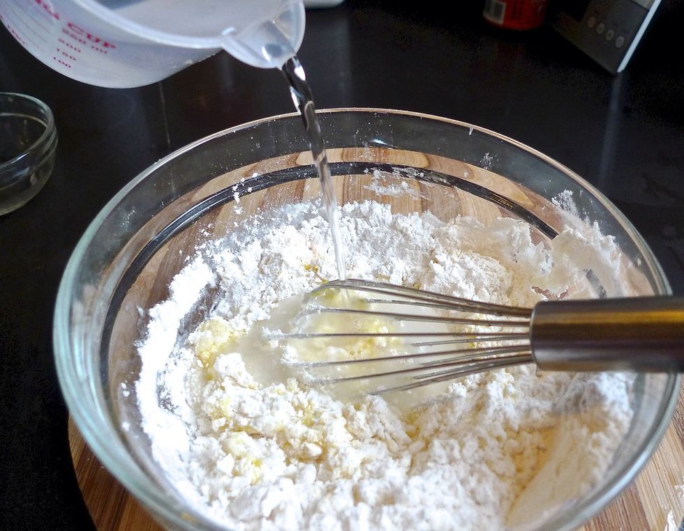 Then add 3/4 cup of water gradually.
