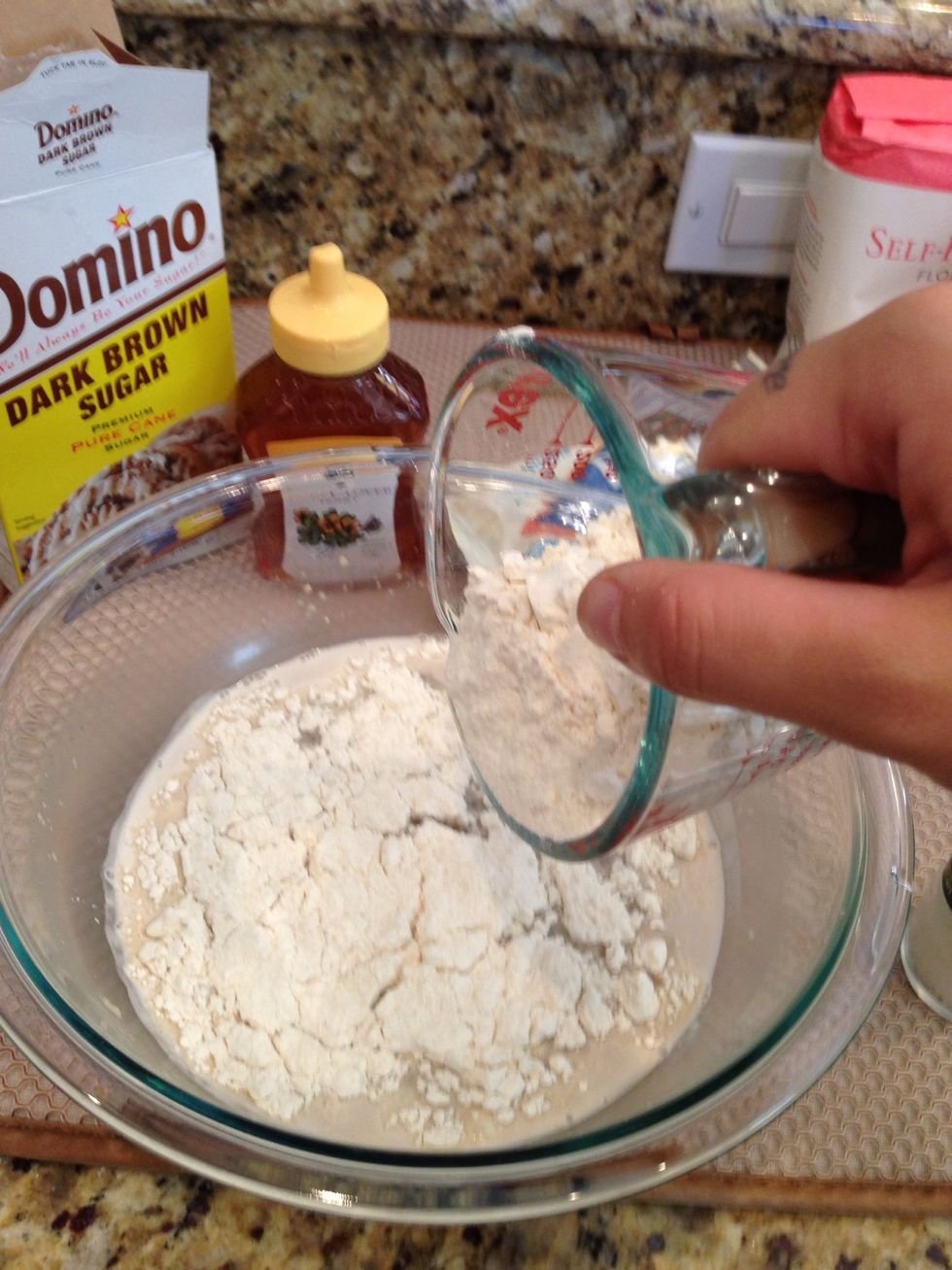 Then add 3 cups of four and 1 cup of self-rising flour and mix