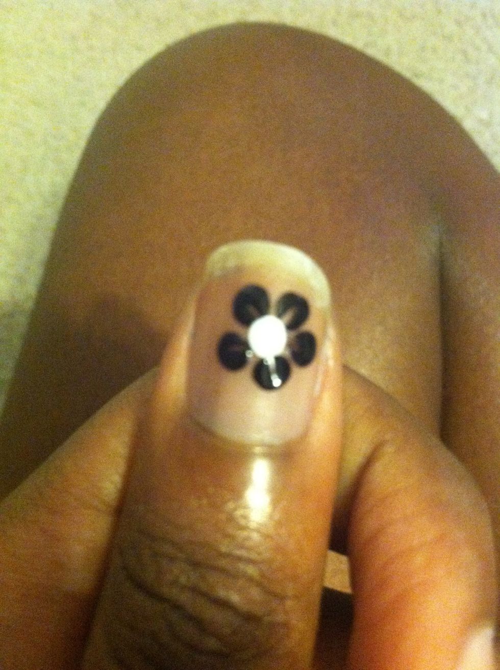 Then add a dot in the middle like this\u2b06.