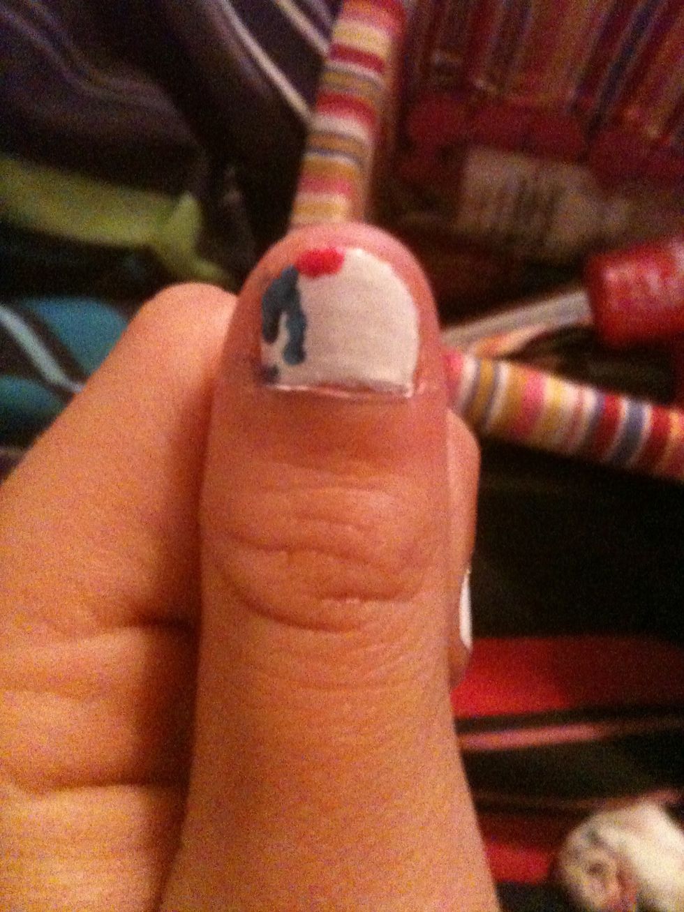 Then add a dot of the second color, touching the fist color