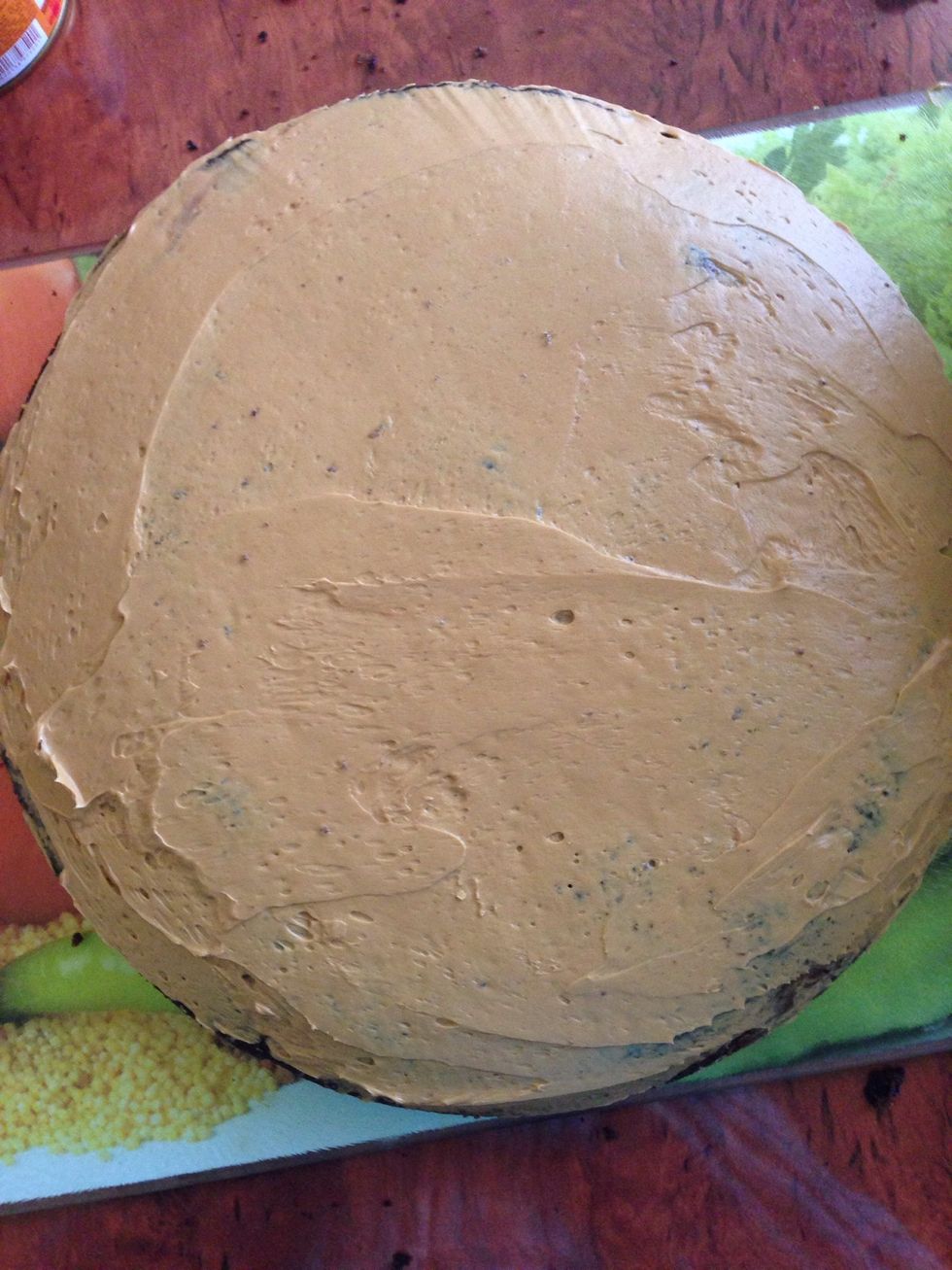 Then add a thin layer of ready frosting