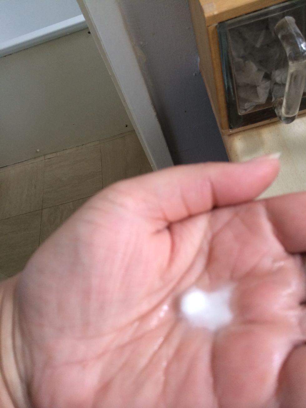 Then add a tiny amount off water to form a paste and get rubbing. Results baby smooth skin. Do twice a week :)