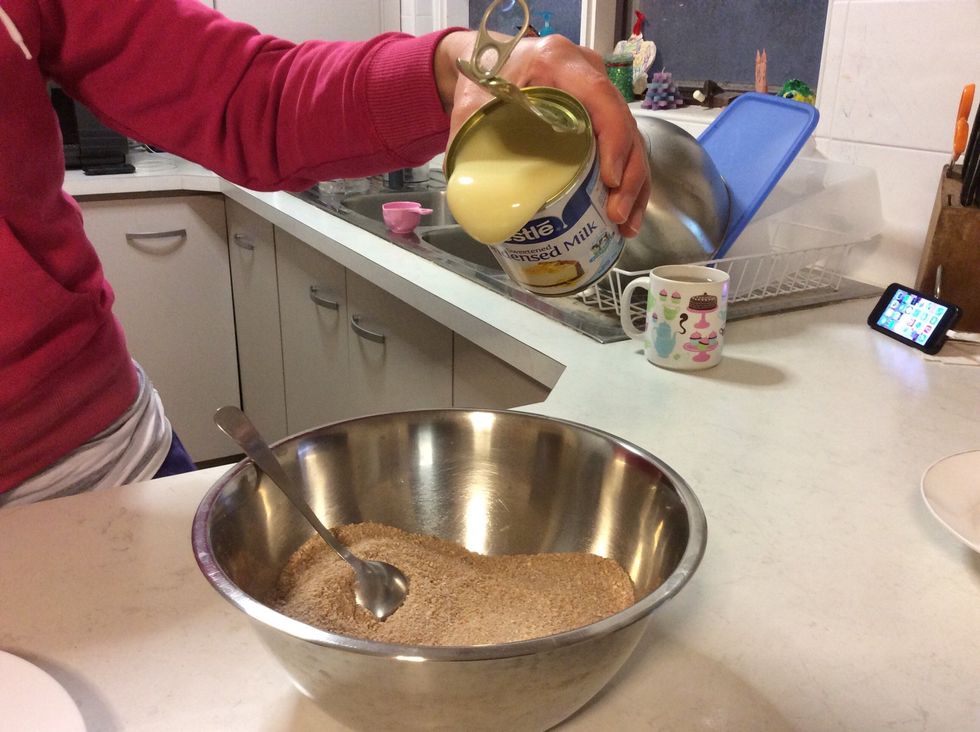 Then add a whole can of condensed milk and mix it until combined. If still dry add a touch of whipping cream or water.\ud83c\udf76