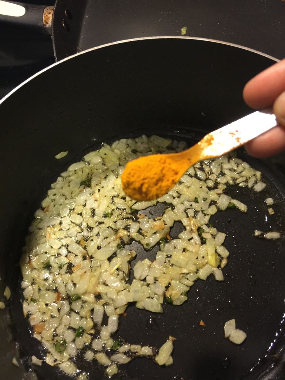 Then add about 1/2 tap of turmeric powder.