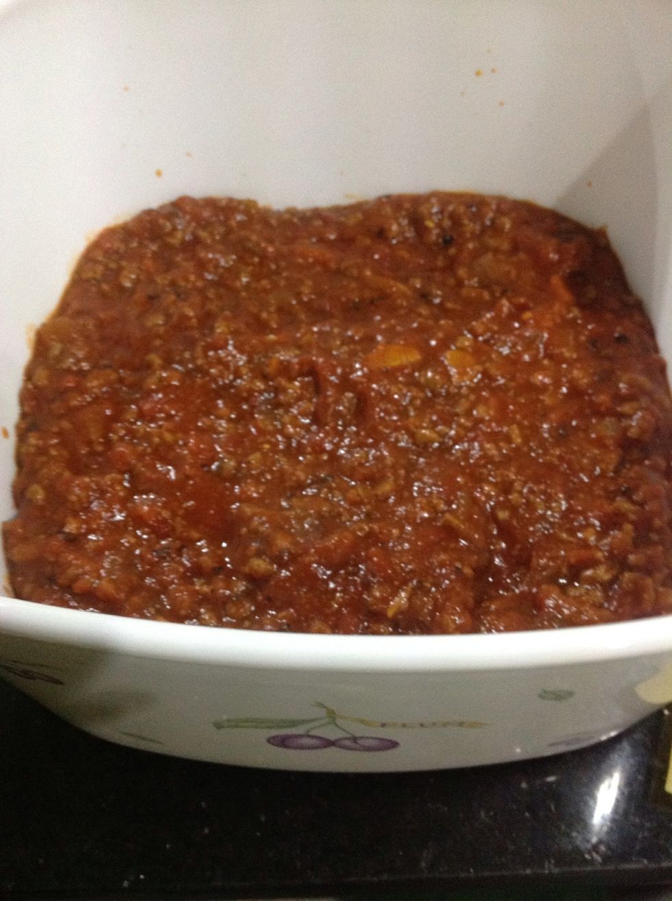 Then add about 1/3 of the sauce on the lasagna sheet.