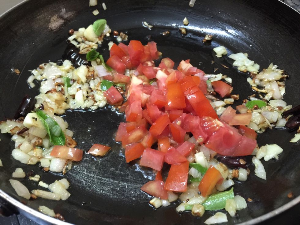 Then add add finely chopped tomatoes