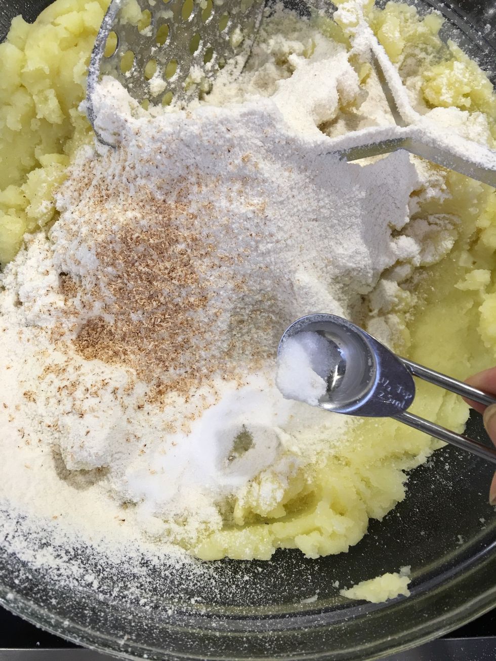 Then add all the other ingredients except the cheese, which you would fold in at the end. For the gluten free, add the baking soda over the mashed potatoes. And leave out the flour and the milk.