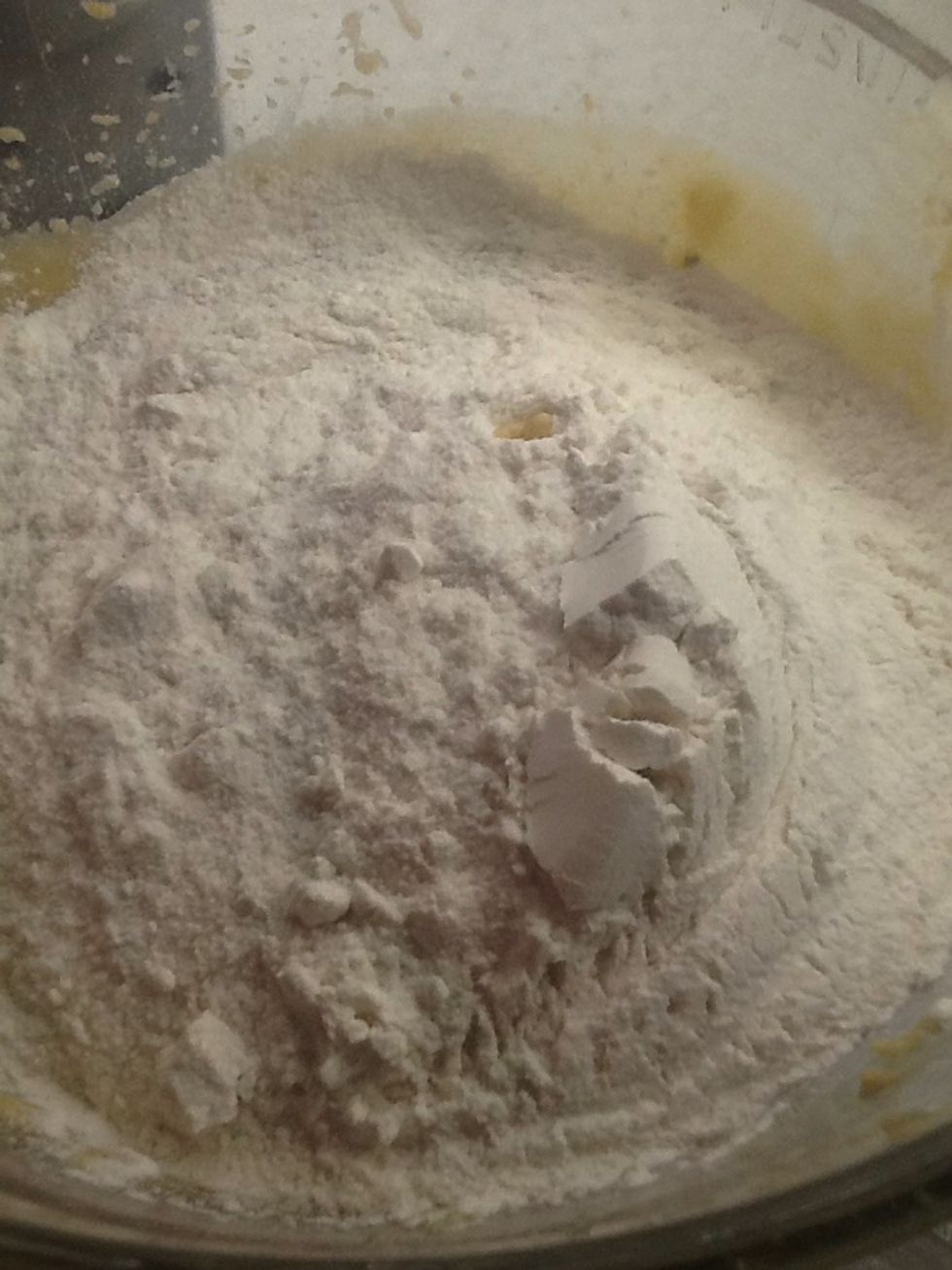 Then,add baking soda in the same measuring cup as your flour. Then put it in the bowl with all the rest of the ingredients.