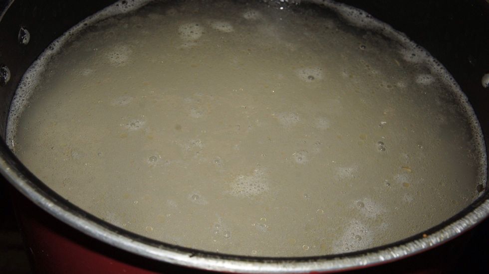 Then add basmati rice and cook for 2-4 mins in high flame, switch off burner when it's half boiled.