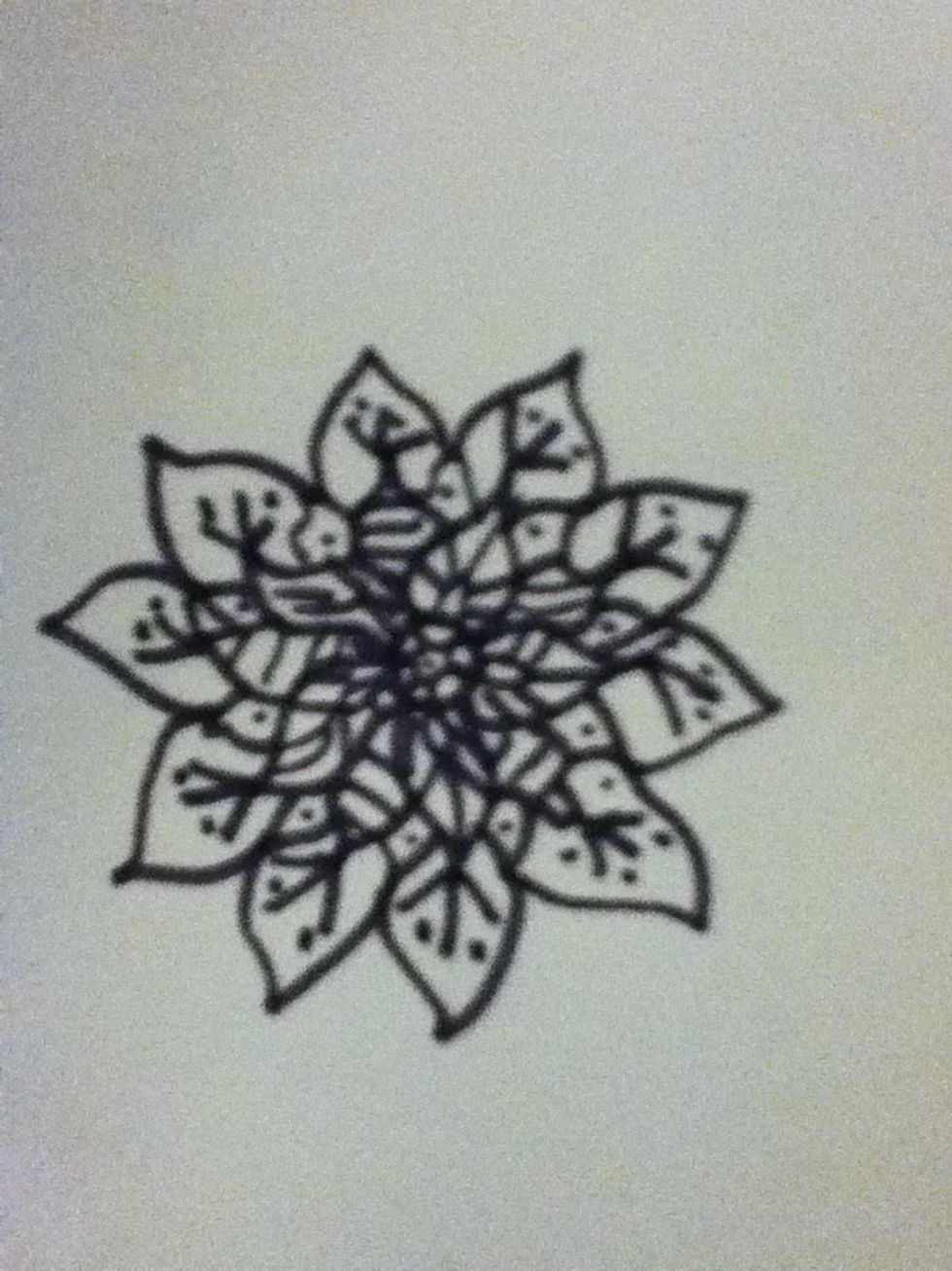Then add bigger petals and decorate them too