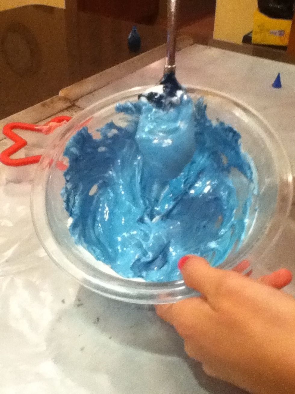 Then add blue dye to a different bowl