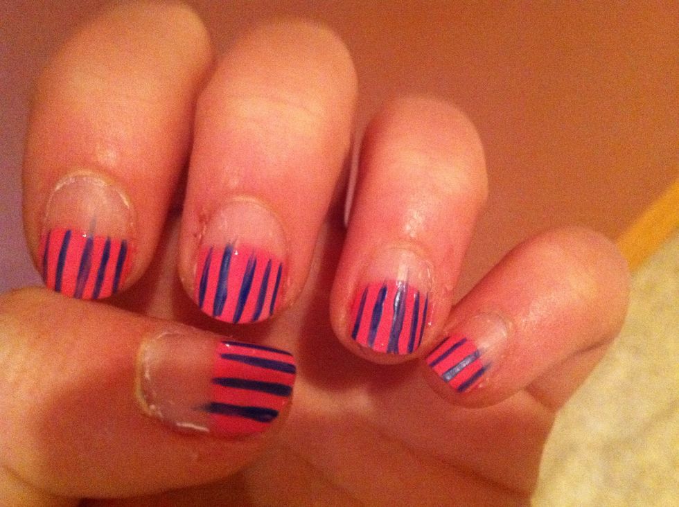 Then add blue stripes with a striper (if you don't have a striper you can create lines by using a tooth pick or bobby pin dipped in nail polish)