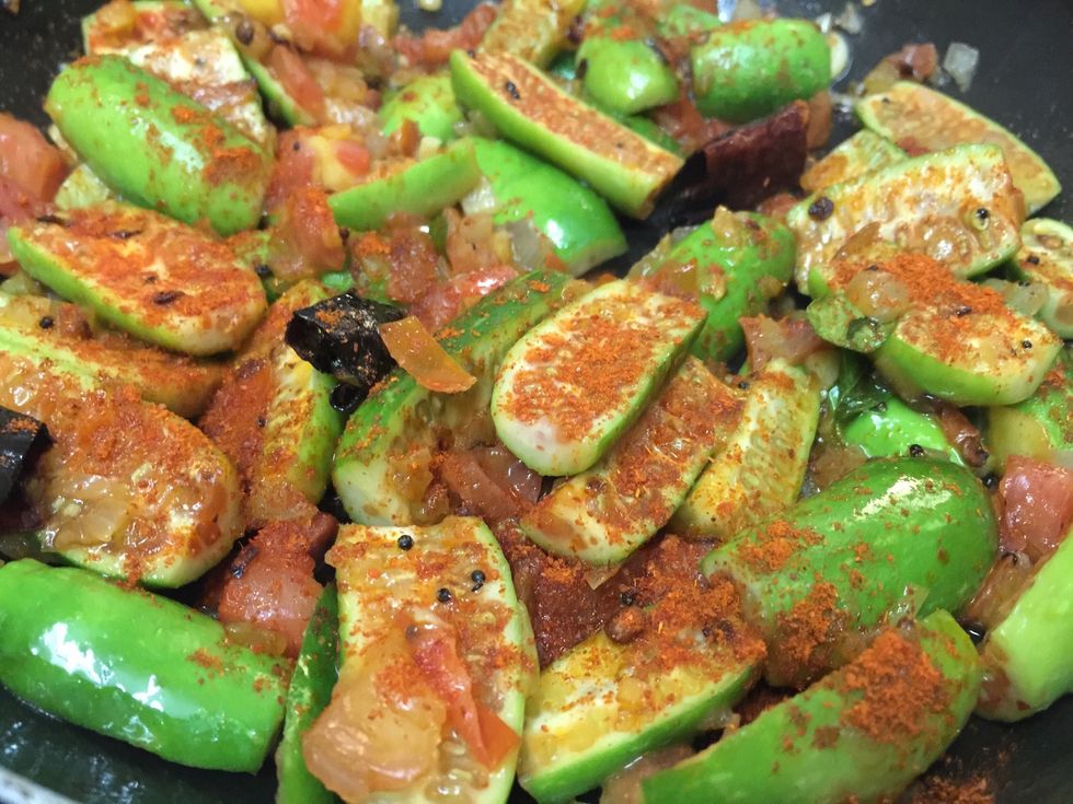 Then add chilli powder and turmeric powder then mix it well