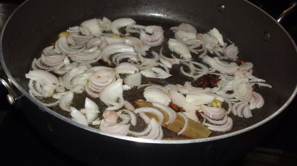 Then add chopped onions add little salt to it and little bit of ginger garlic paste.