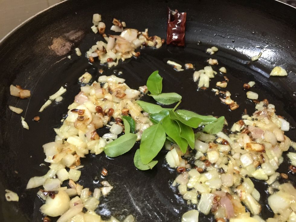 Then add curry leaves and saut\u00e9