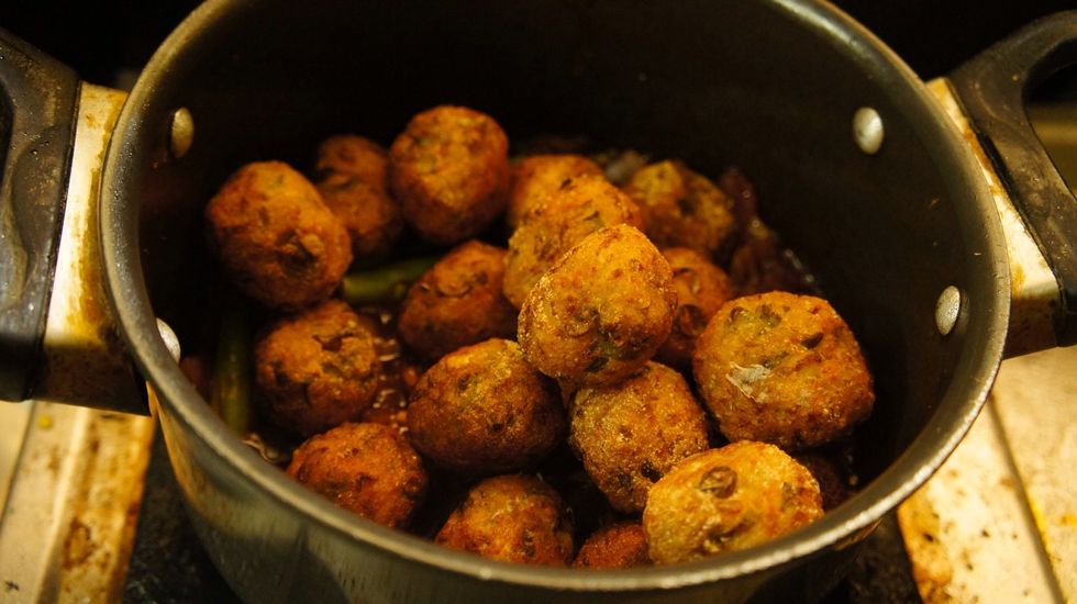 Then add deep fried veg balls to the garnishing sauce ...