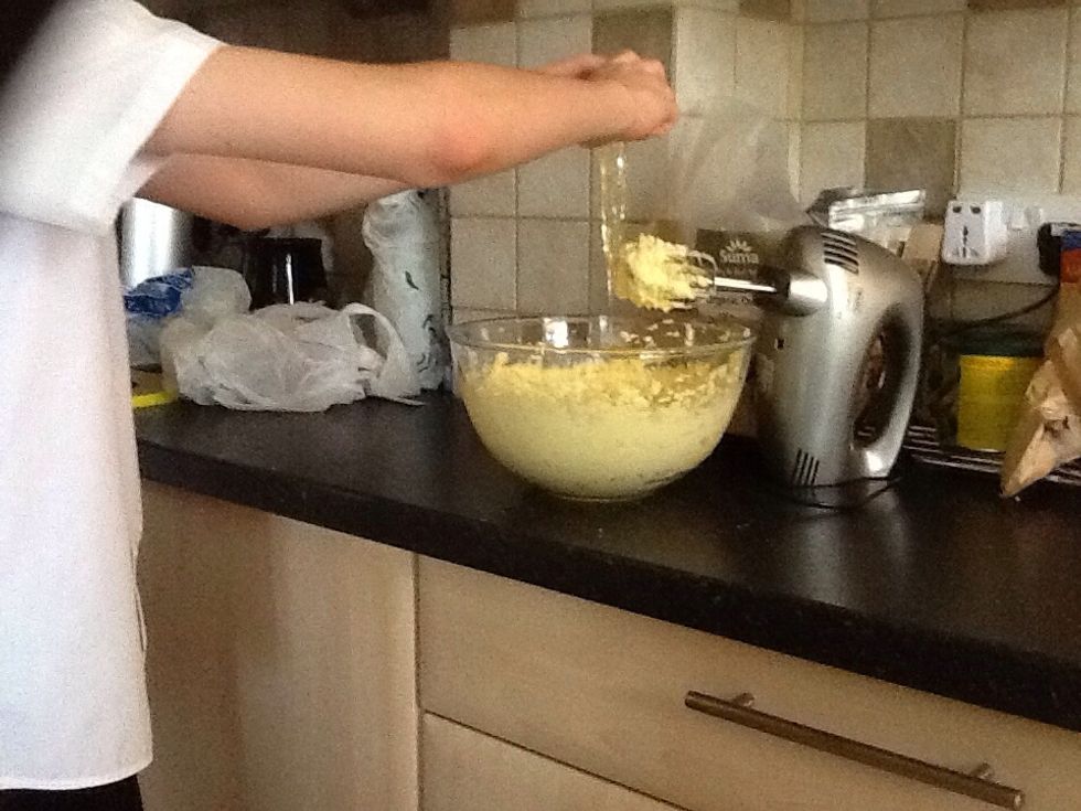 Then add five eggs to the mixture and stir after each egg