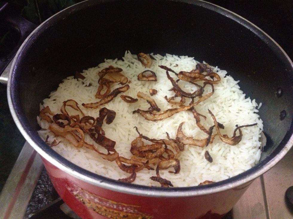 Then add fried onions as a topping on that layer...
