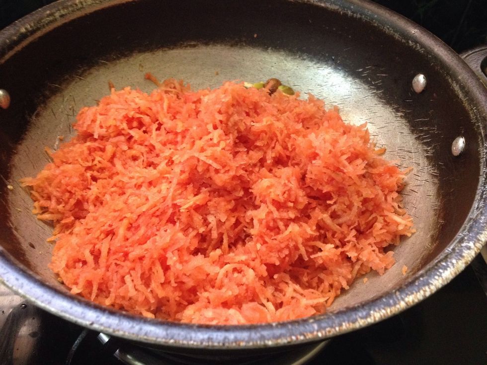 Then add grated carrot into the mixture...