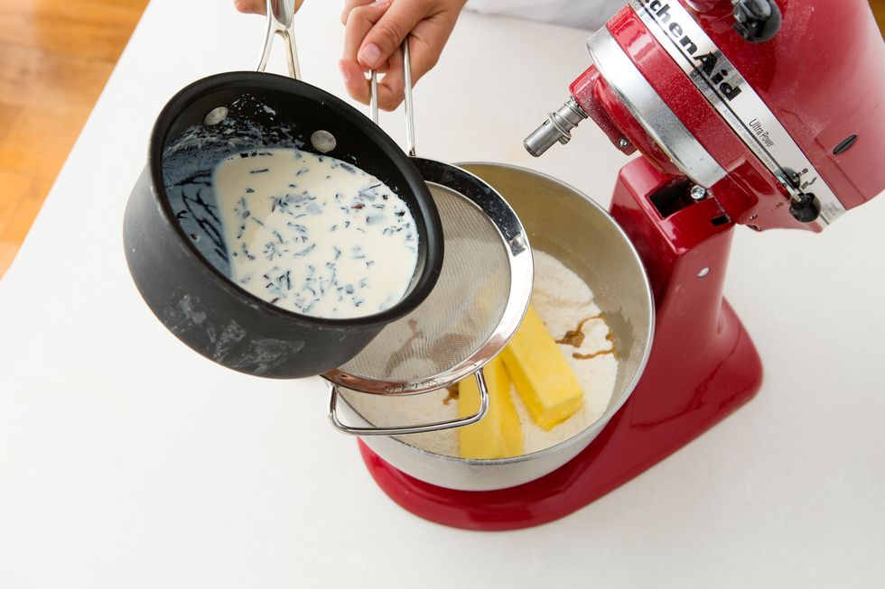 Then add in butter, vanilla and tea-infused milk and beat on low until dry ingredients are fully moistened.