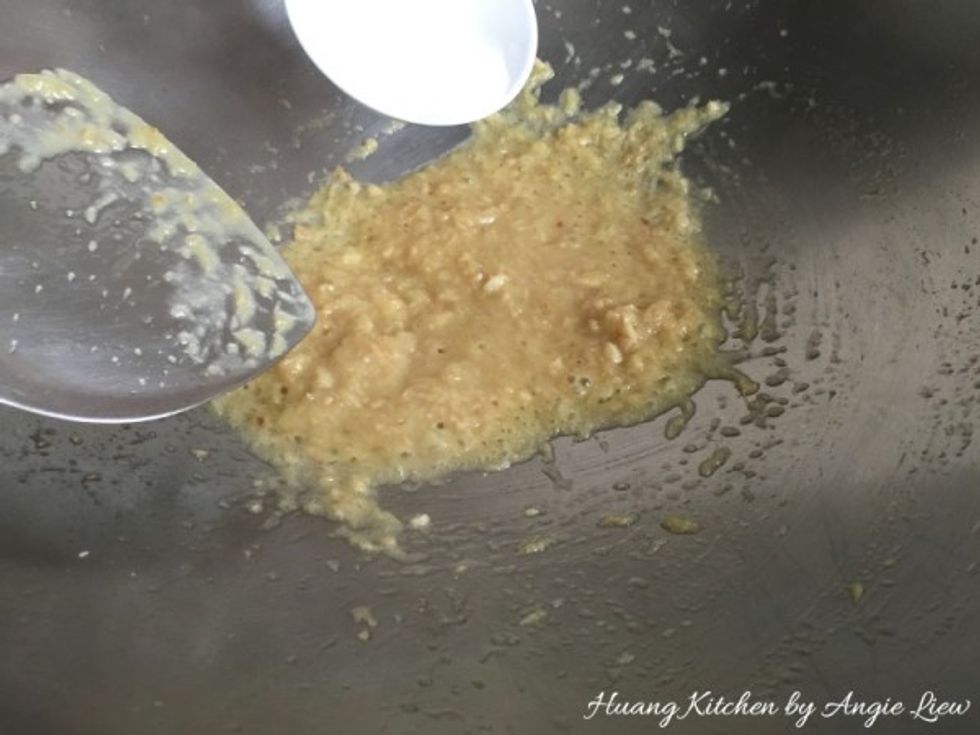 Then add in cornstarch solution. When the ginger paste has thickened, dish it up into a bowl and set aside.