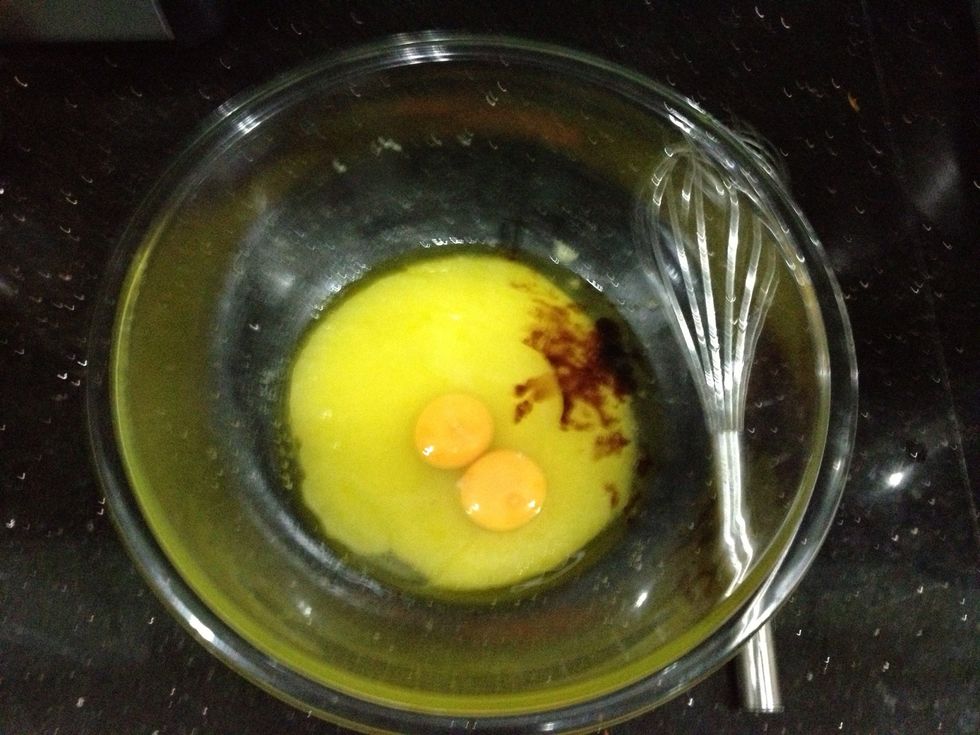Then add in eggs and vanilla, whisk it.