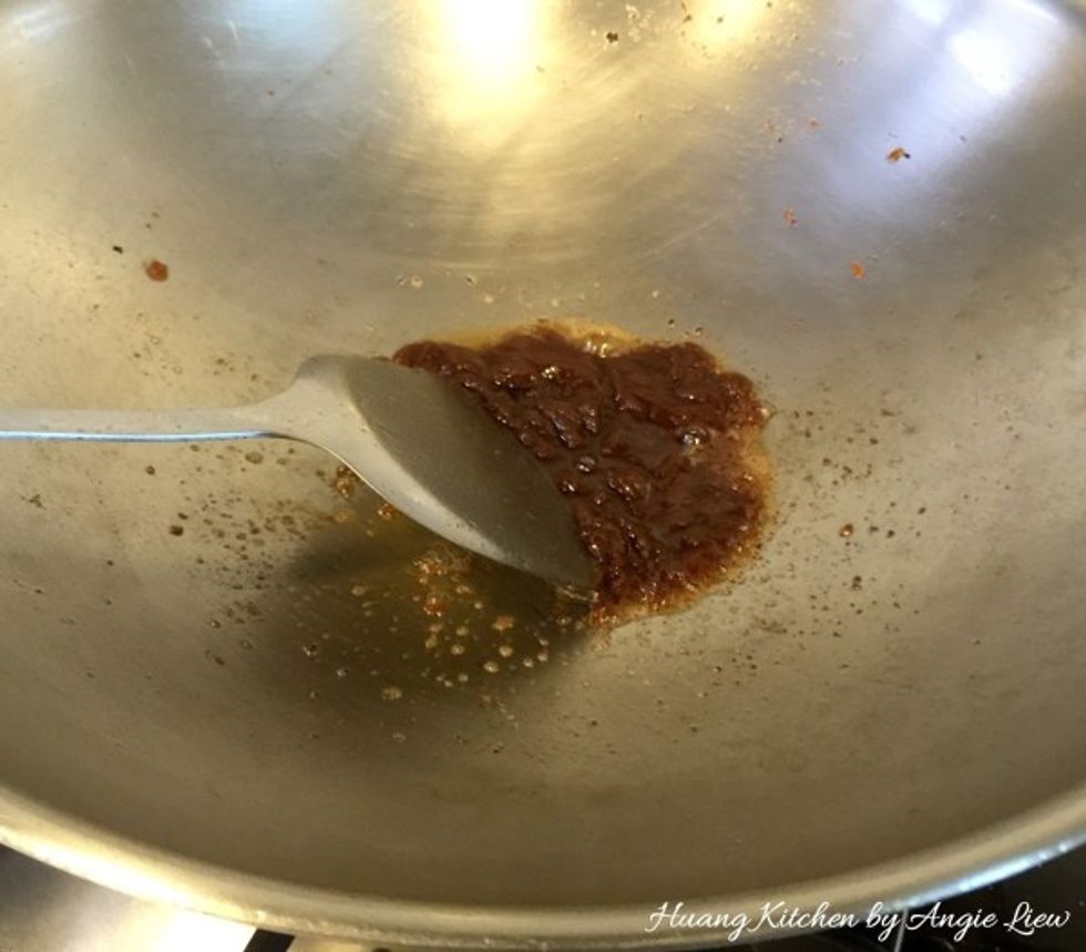 Then add in fermented bean paste and stir fry for about 1 minute.