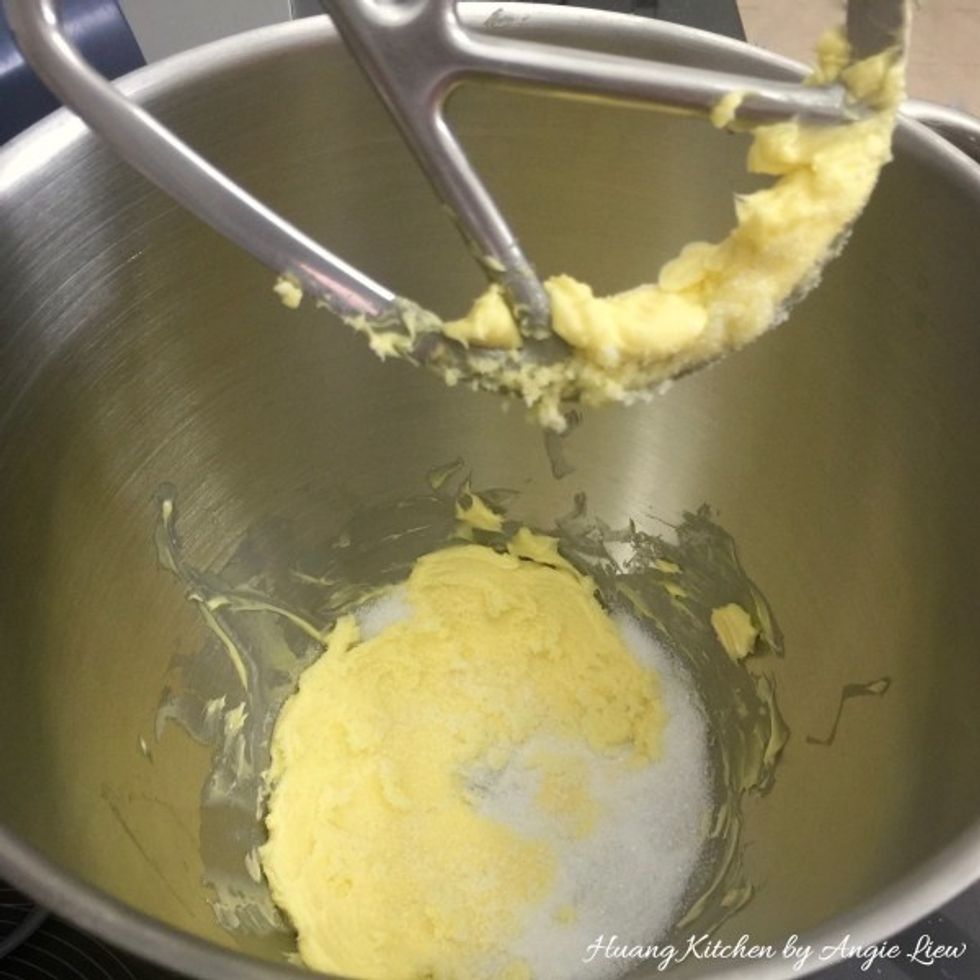 Then, add in sugar and beat until its light and fluffy (2 - 3 minutes). This is to give it a lighter texture cookie.