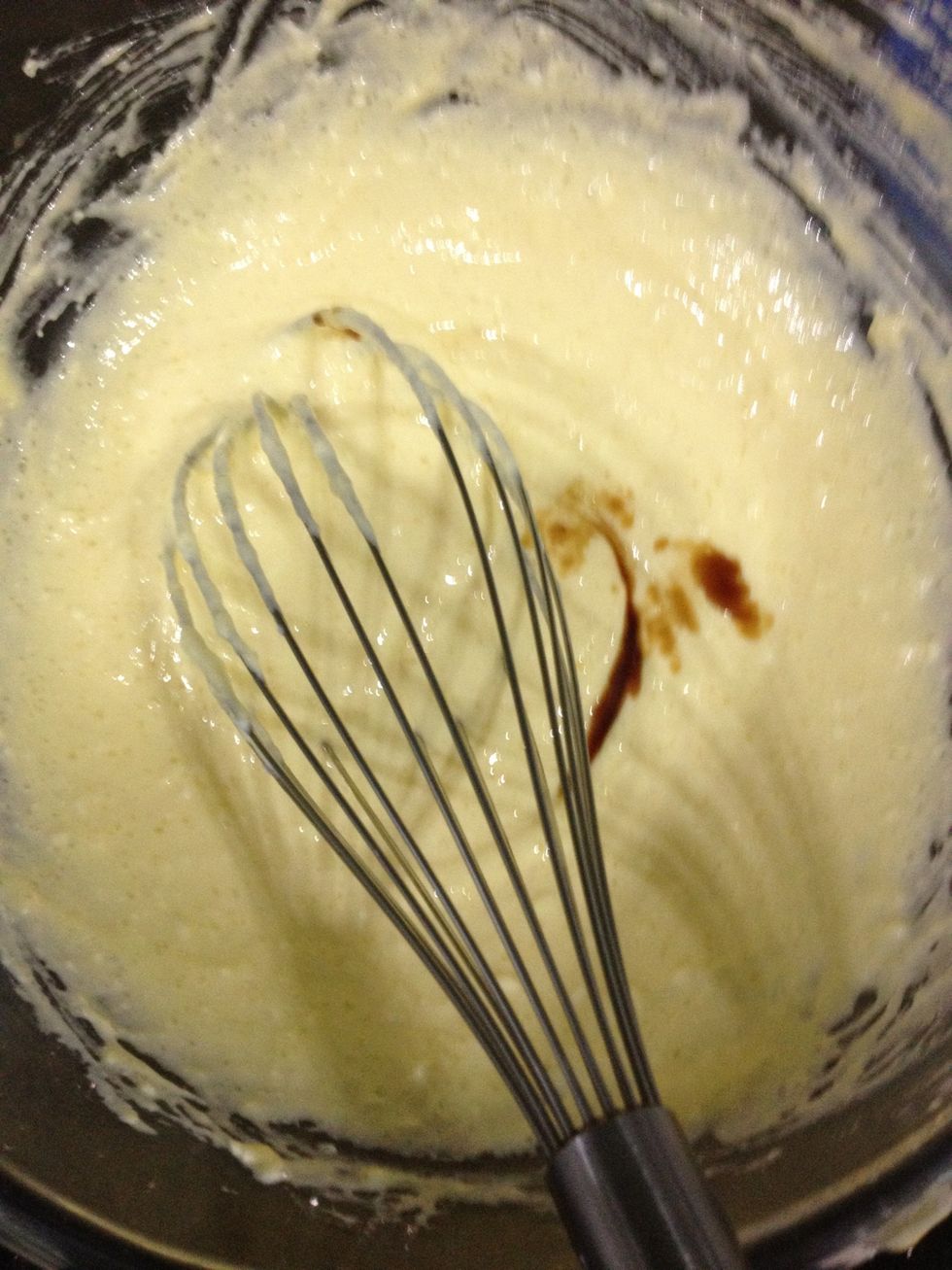 Then add in vanilla. And also add in the mascarpone cheese.