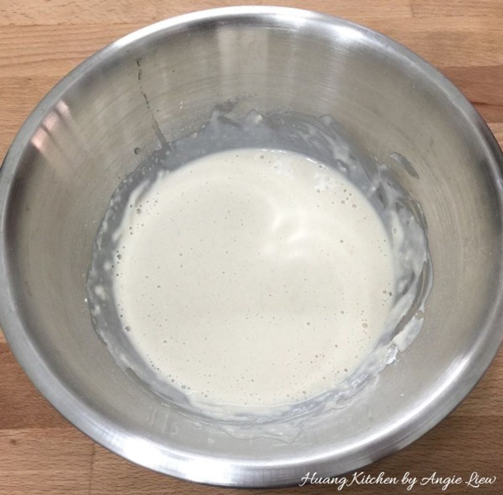 Then add in water. Stir to mix well and then set aside to proof for 30 minutes.