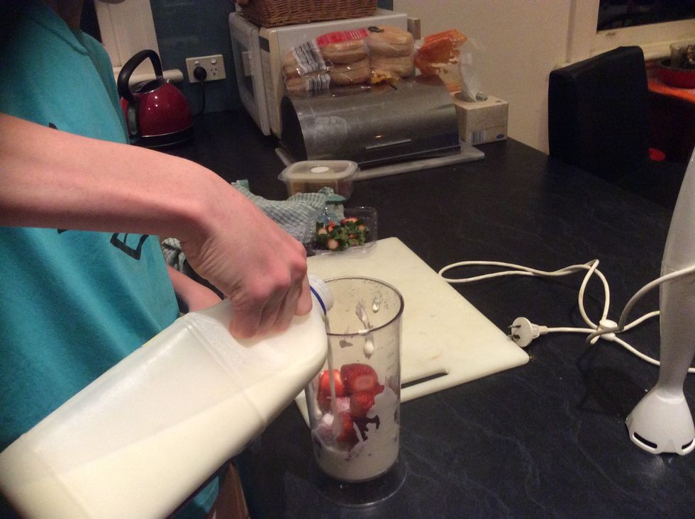 Then add milk to the cup