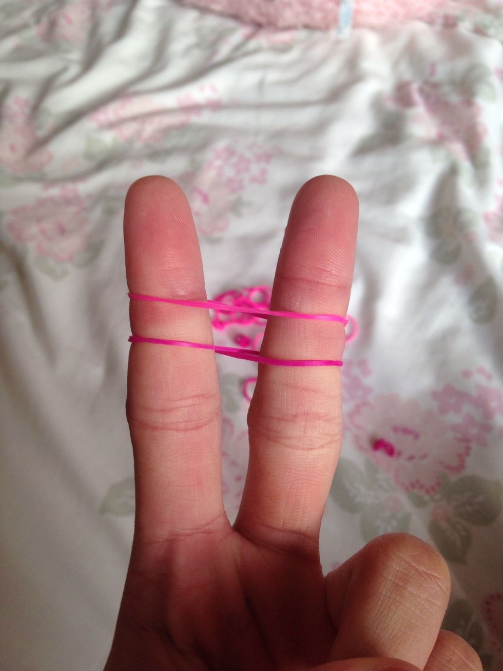 Then add one band on top. This band is NOT twisted.