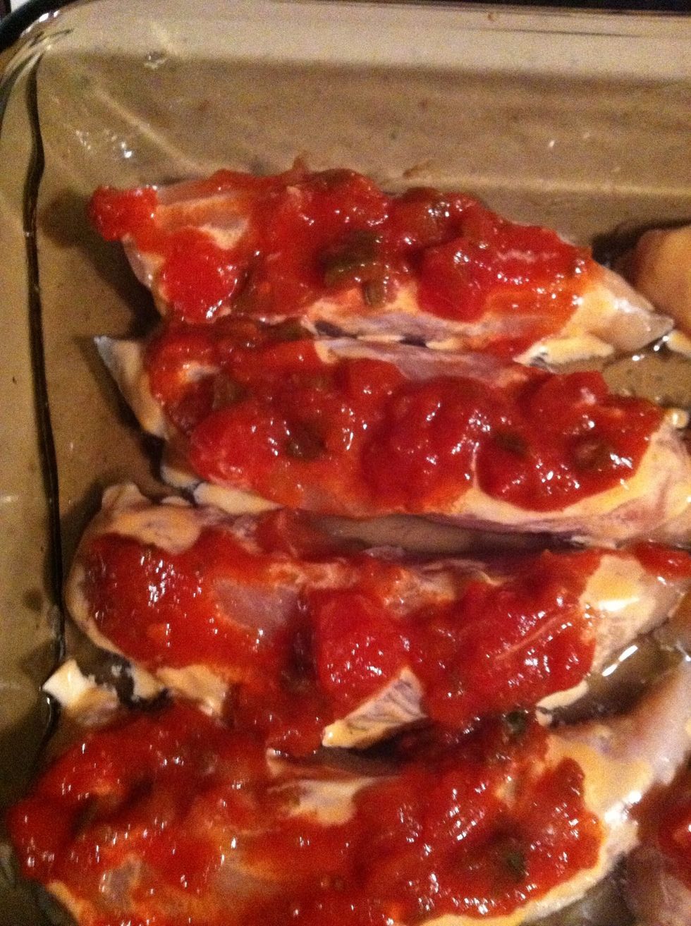 Then add one half to one tablespoon of your favorite salsa onto of the dressing. I'm using chi chi's mild salsa!